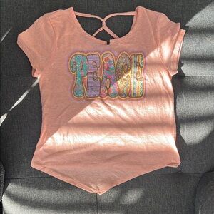 Peach Graphic Tee with Colorful Design